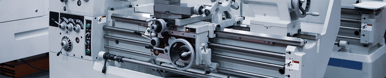 adjusting handwheels and levers on a machine