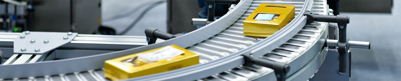 yellow boxes on a conveyer belt