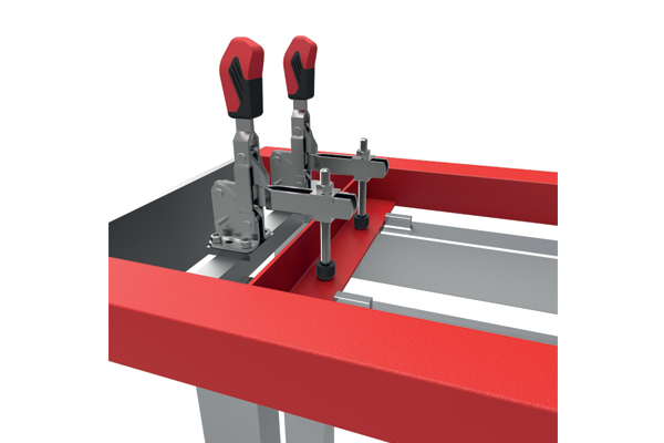 Toggle clamps for welding applications
